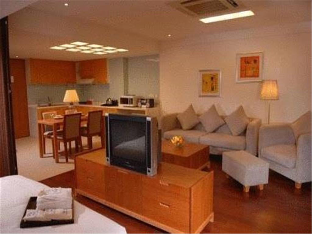 Gloria Plaza Hotel Kangqiao Shanghai Zimmer foto