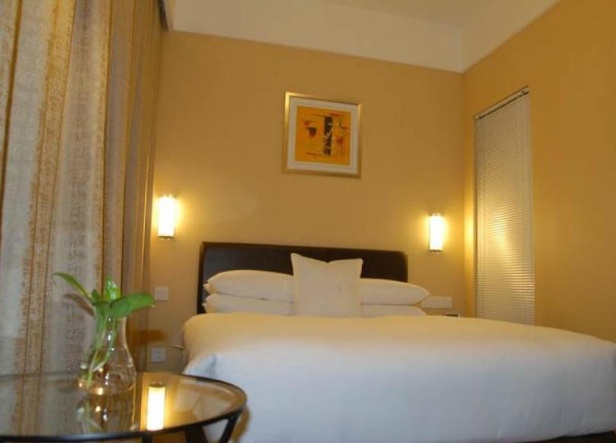 Gloria Plaza Hotel Kangqiao Shanghai Exterior foto