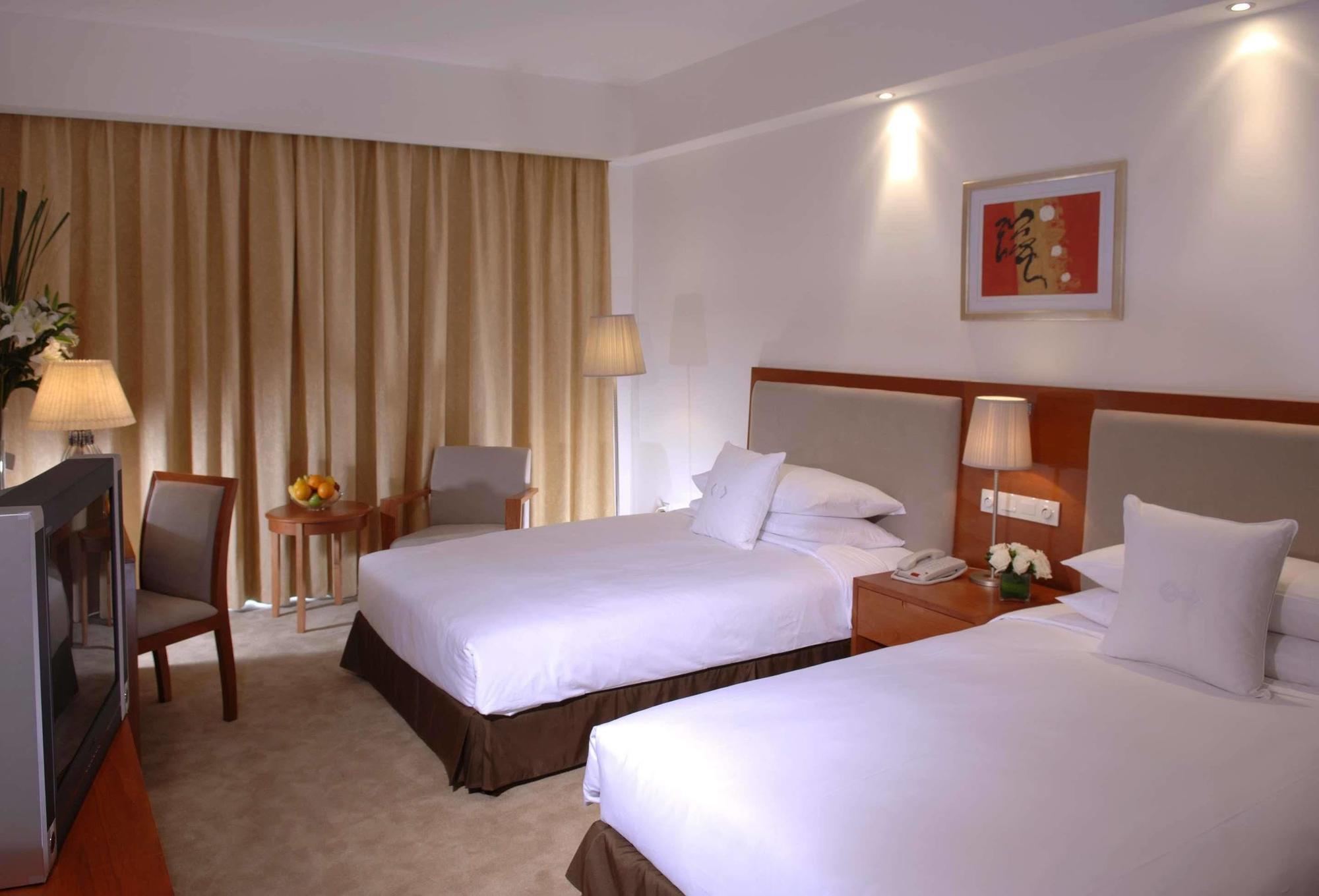 Gloria Plaza Hotel Kangqiao Shanghai Zimmer foto